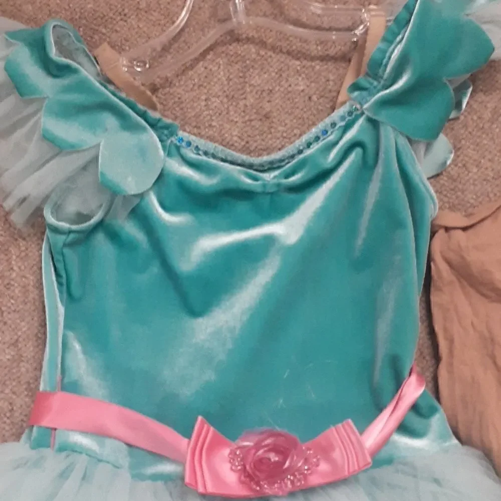 Munchkin costumes:Adorable Revolution turquoise with pink beaded roses / tights.